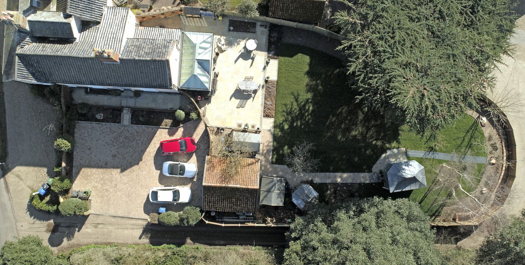 Aerial view of a garden with curved sleeper beds