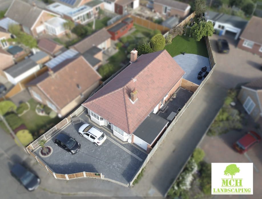Aerial view of a bungalow with a new driveway and front garden